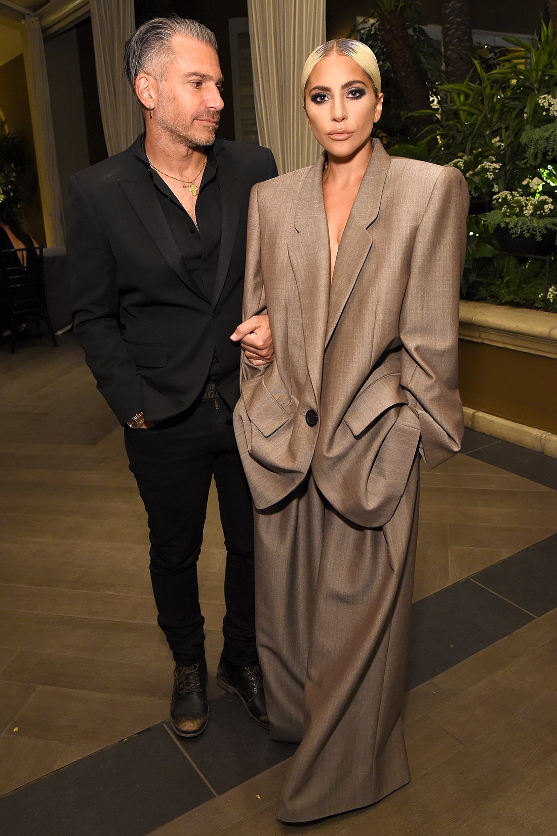 LOS ANGELES, CA - OCTOBER 15:  Christian Carino (L) and Lady Gaga attend ELLE's 25th Annual Women In Hollywood Celebration presented by L'Oreal Paris, Hearts On Fire and CALVIN KLEIN at Four Seasons Hotel Los Angeles at Beverly Hills on October 15, 2018 in Los Angeles, California.  (Photo by Michael Kovac/Getty Images for ELLE Magazine)
